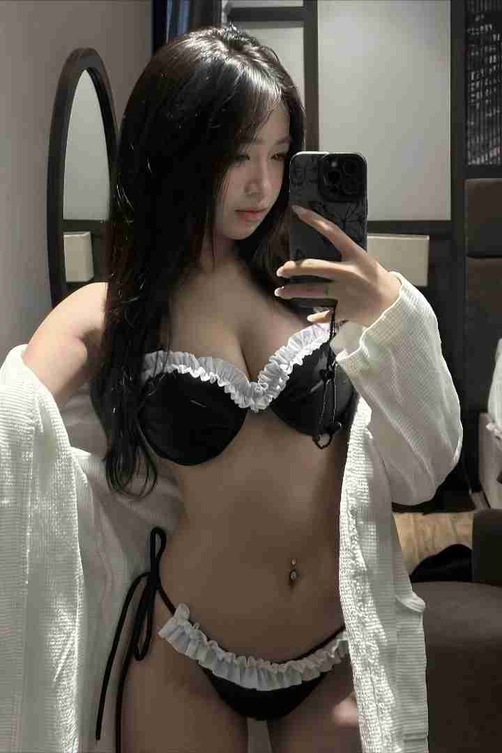 KL Escort Girl Woman in lingerie and robe takes a mirror selfie in Front Page blog post. Malaysia Sex Call Girl