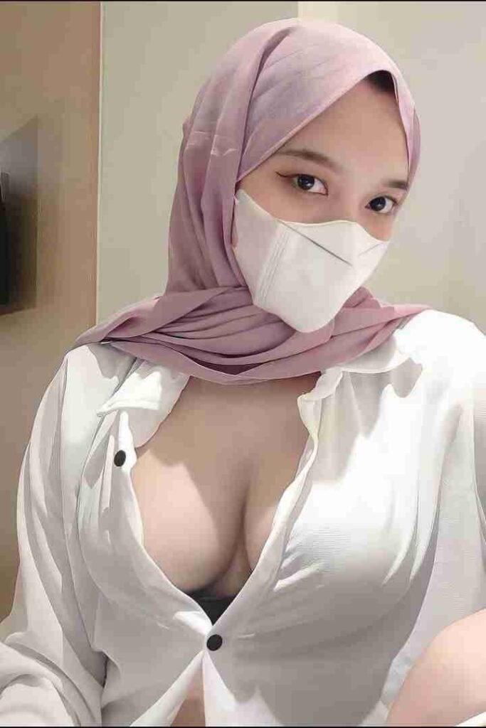 KL Escort Girl Woman in hijab and mask wearing a partially unbuttoned white shirt. Malaysia Sex Call Girl