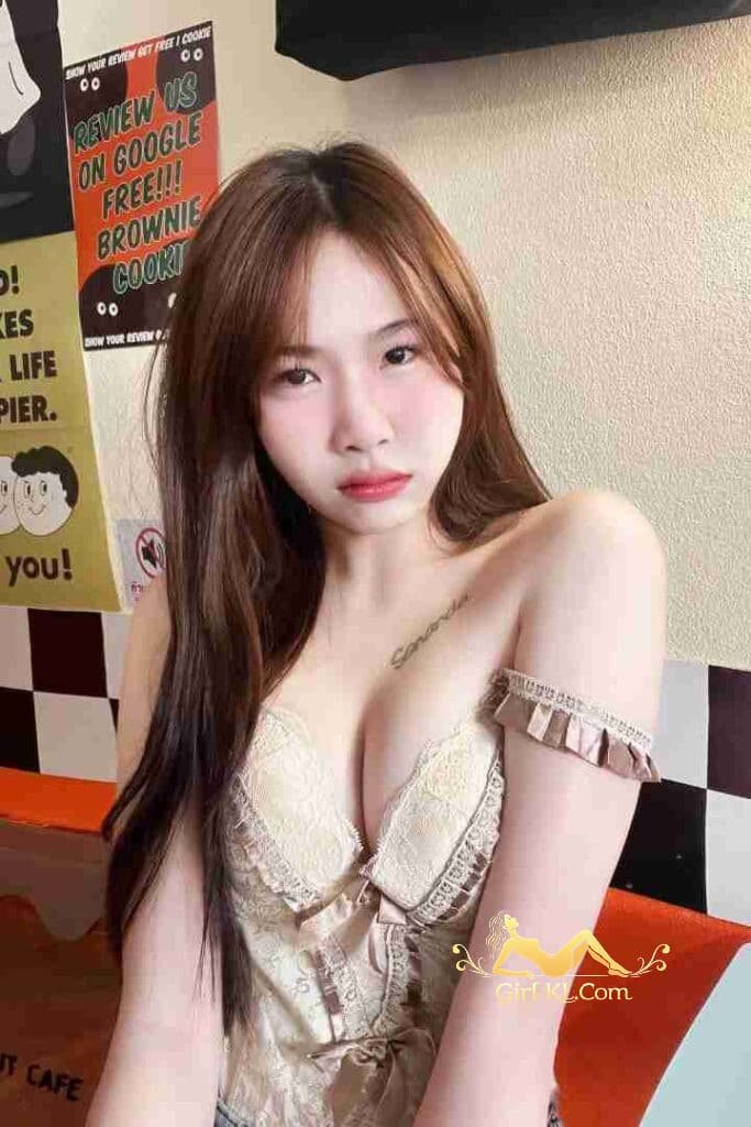 Stunning Thai woman, possibly escort, in Kuala Lumpur. C cup beauty.