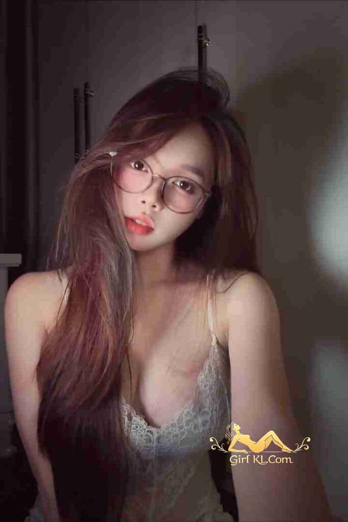 Attractive woman with glasses and lingerie. KL escort, Mia. C cup. Vietnamese woman.